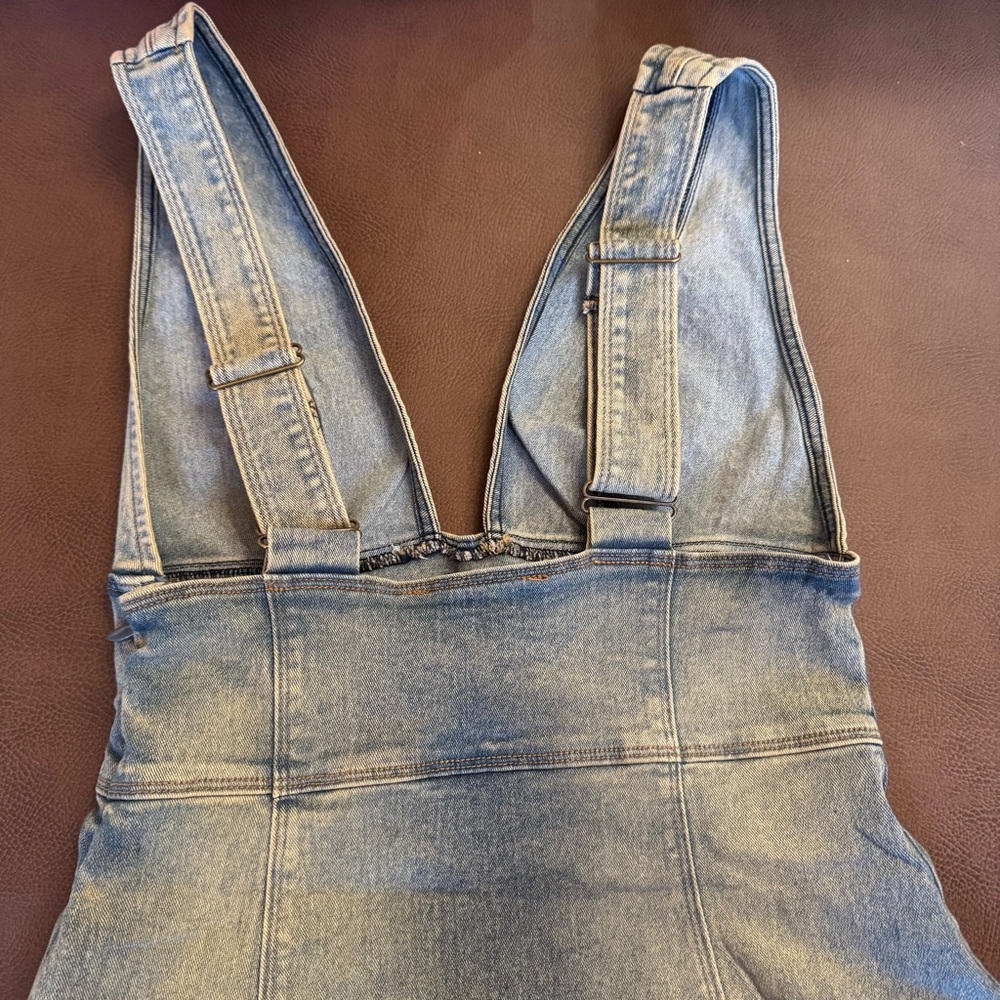 UO Guilty Pleasure Studded Denim Mini Dress

Non Smoking/No Pets - Picture 8 of 14